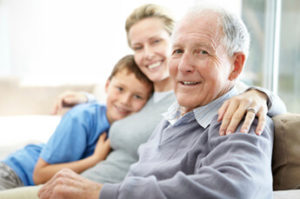 Grandfather with daughter and child after Retinal Detachment Surgery